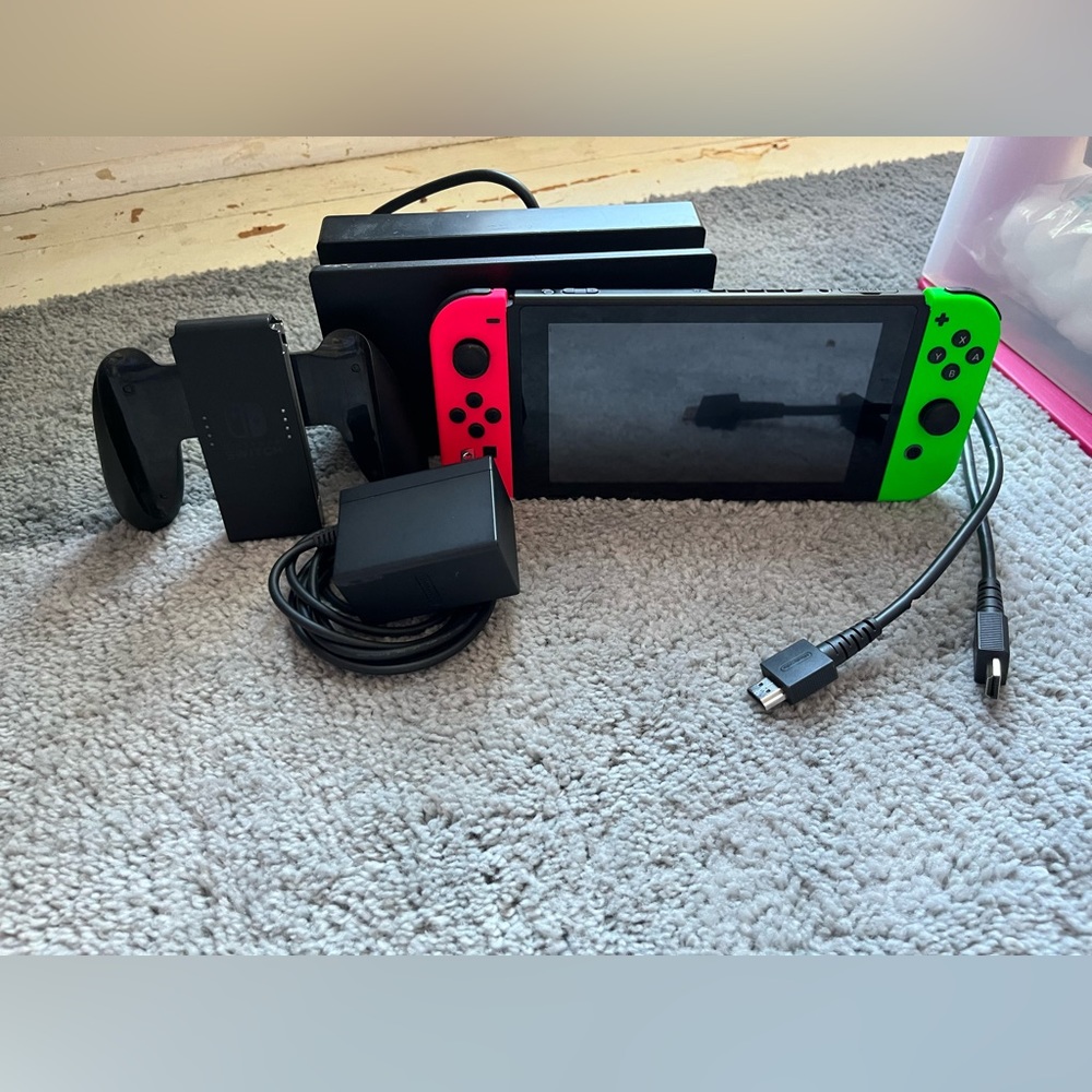 green and pink nintendo switch